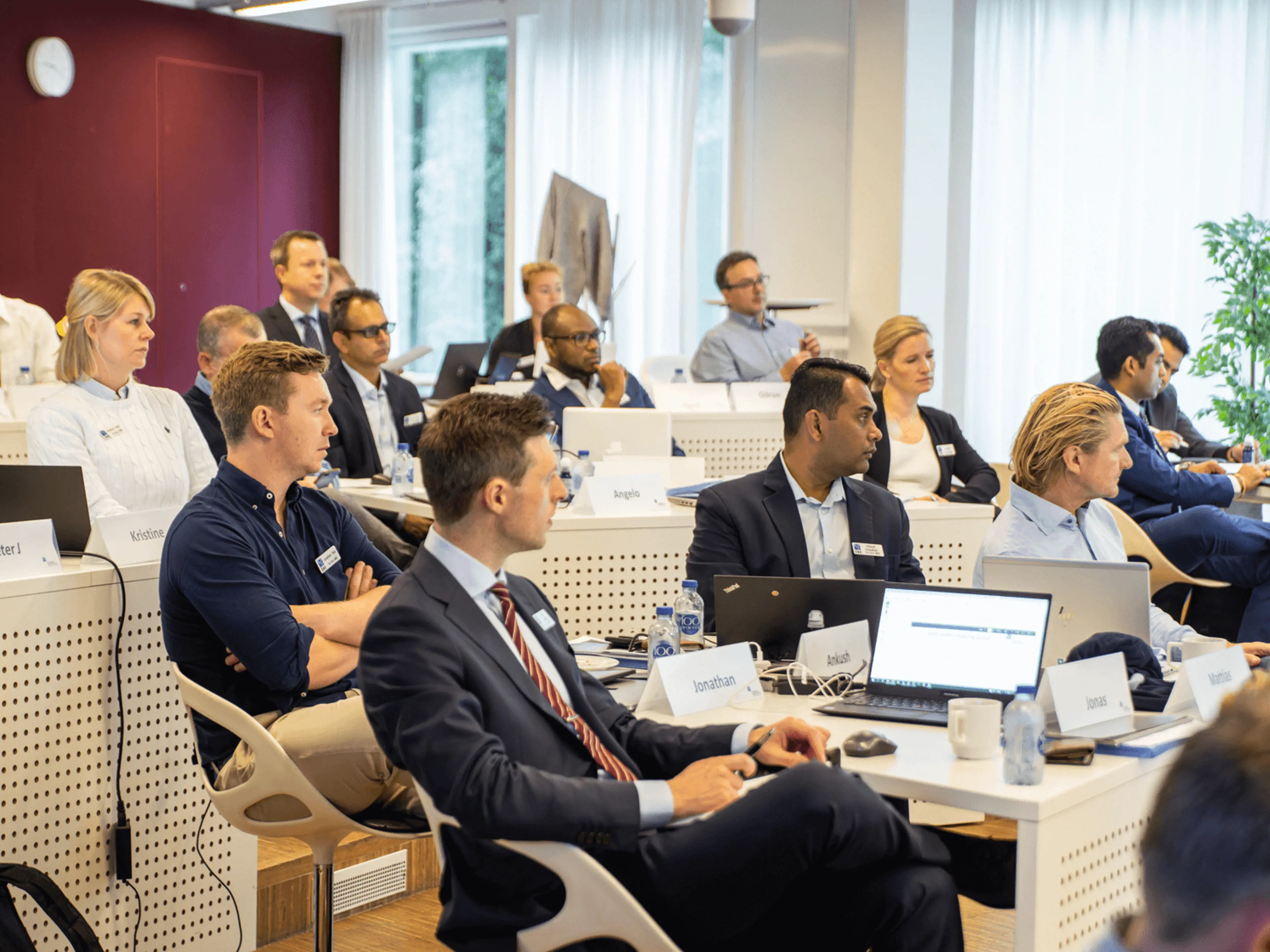 Blue MBA participants in class