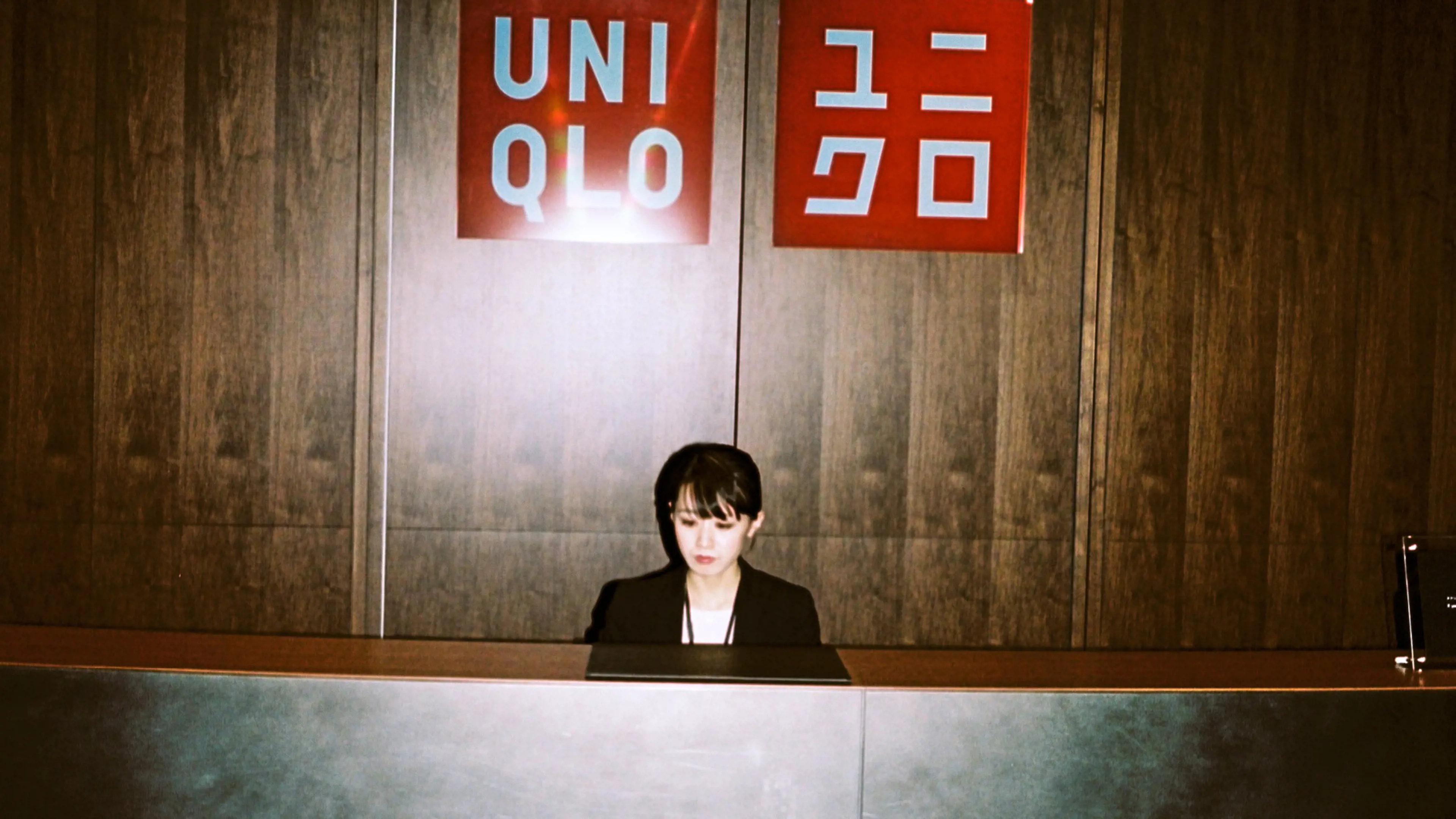 A receptionist at Uniqlo's offices