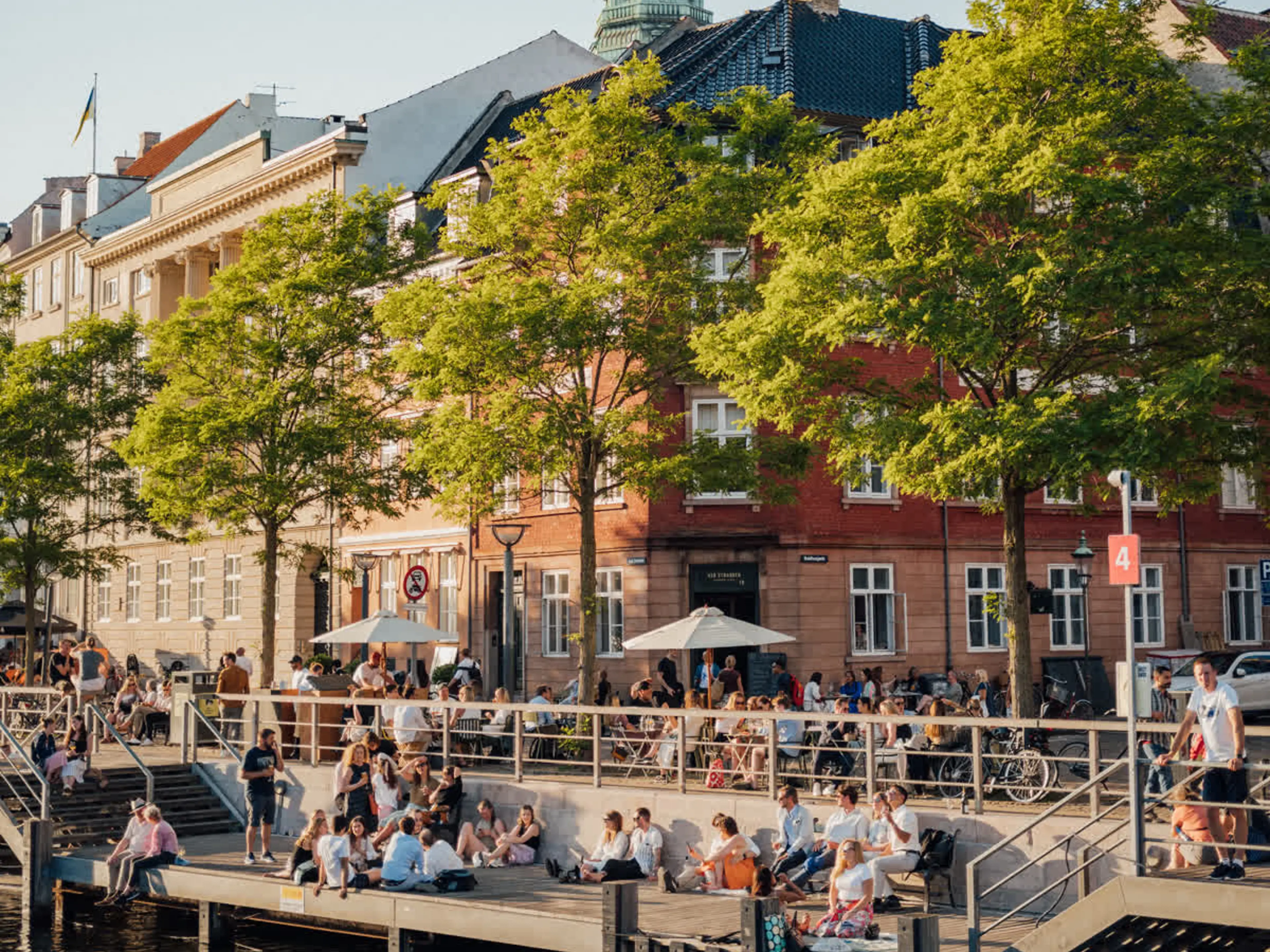 People enjoying the sun in city centre of Copenhagen