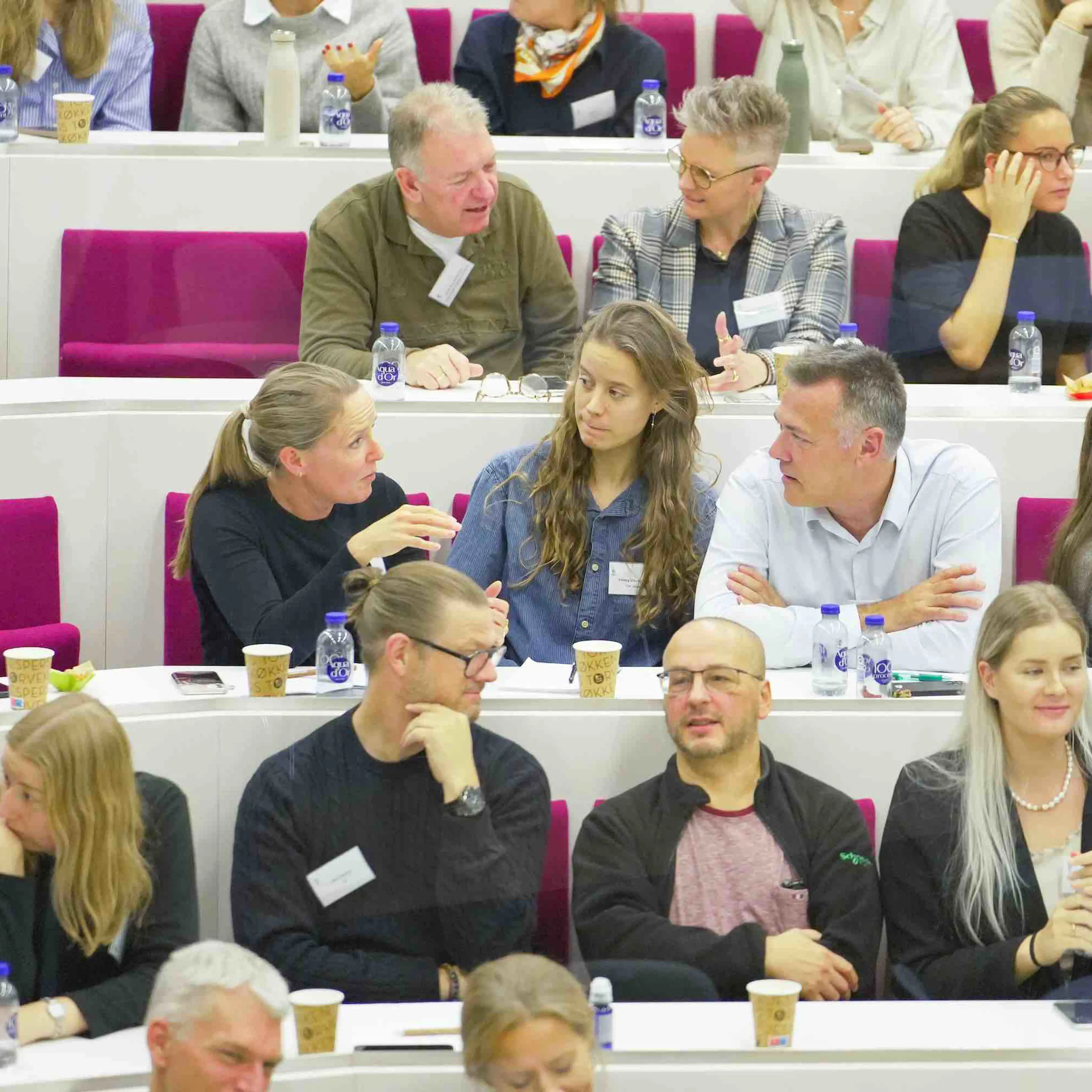 Audience speaking together at the New Management Strategies for New Generations event