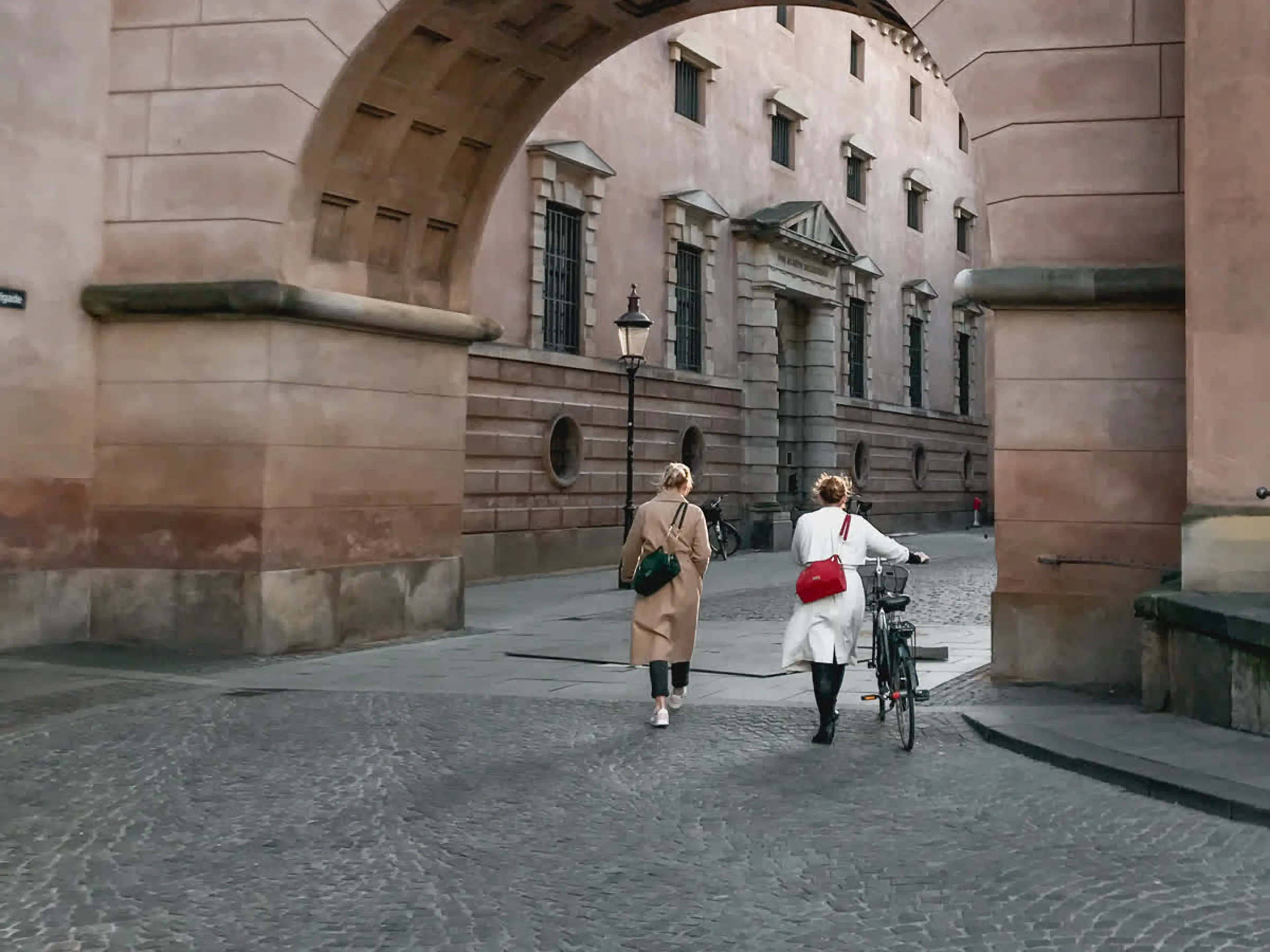 Two women walking through Copenhagen centre